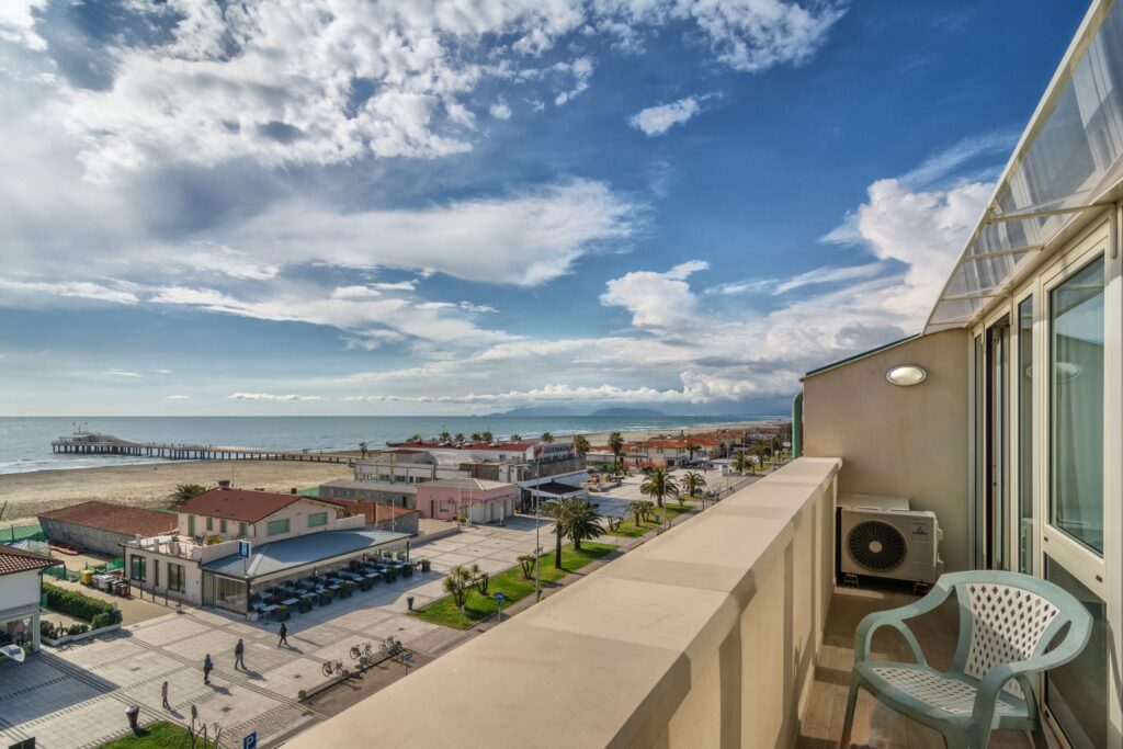 The seafront promenade and the pier of Lido di Camaiore seen from the balcony of a room at Hotel La Vela
